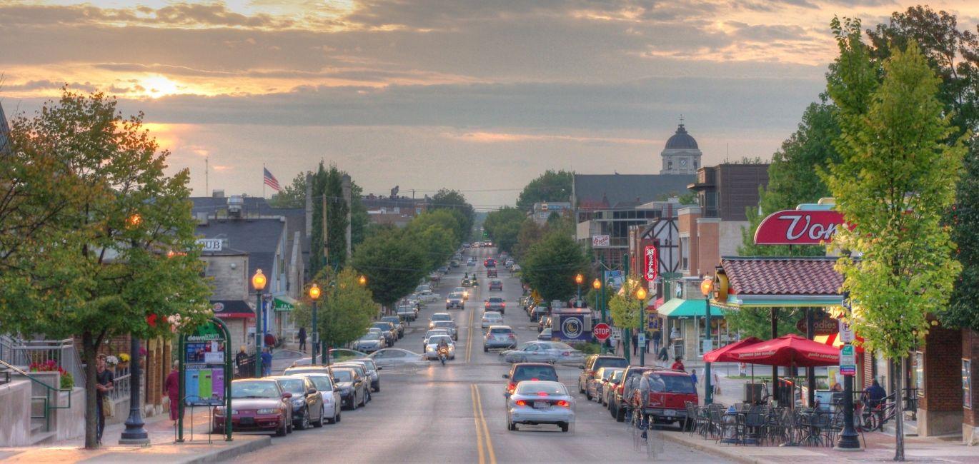 view of Kirkwood Avenue toward courthouse square at sunset